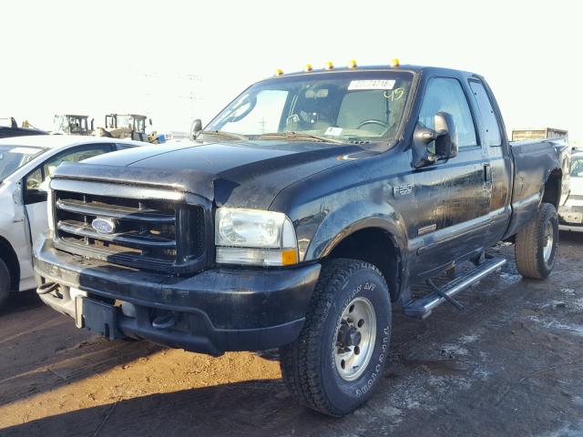 1FTSX31P04EC38876 - 2004 FORD F350 SRW S BLACK photo 2