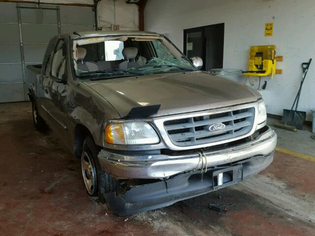 2FTRX17W72CA85577 - 2002 FORD F150 GOLD photo 1