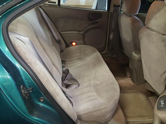 1G2NE52T9XM705110 - 1999 PONTIAC GRAND AM S მწვანე ფოტო 6