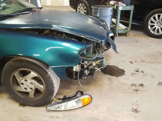 1G2NE52T9XM705110 - 1999 PONTIAC GRAND AM S მწვანე ფოტო 9