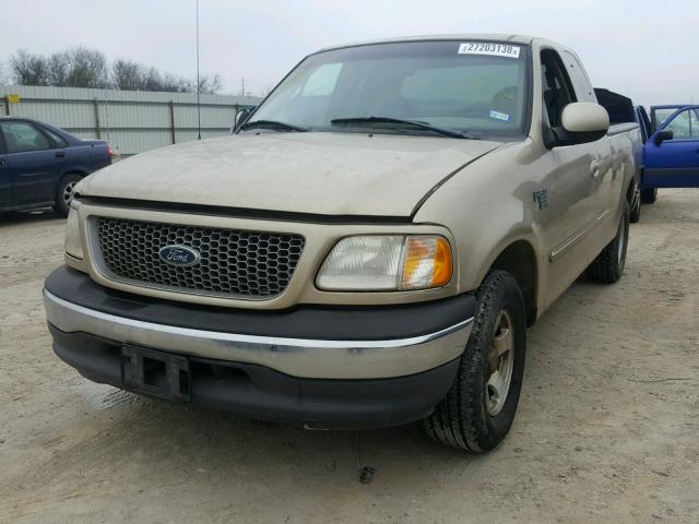 1FTRX17W2XKA00776 - 1999 FORD F150 TAN photo 2