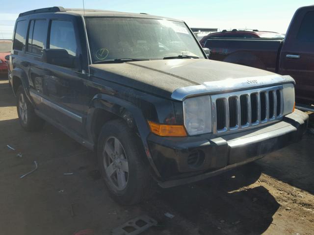 1J8HG48K76C338135 - 2006 JEEP COMMANDER BLACK photo 1