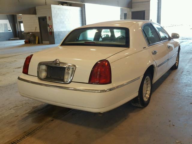 1LNHM81W5YY868111 - 2000 LINCOLN TOWN CAR E WHITE photo 4