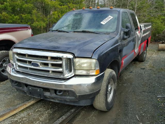 1FDSW35P54EA48936 - 2004 FORD F350 SRW S BLUE photo 2