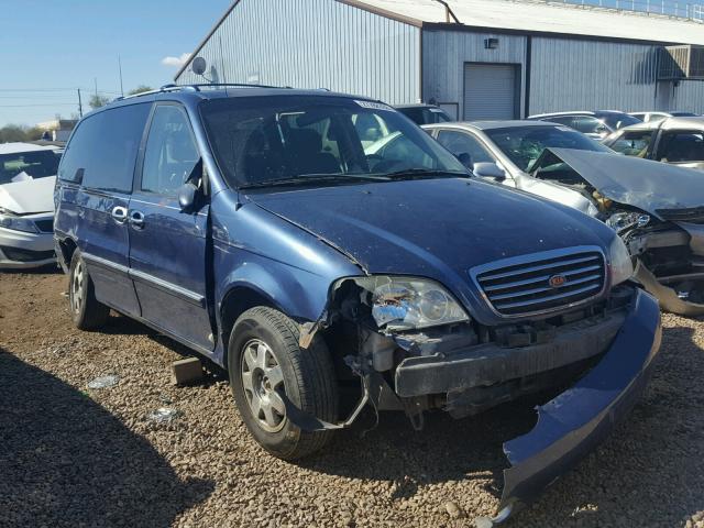 KNDUP131826325891 - 2002 KIA SEDONA EX BLUE photo 1