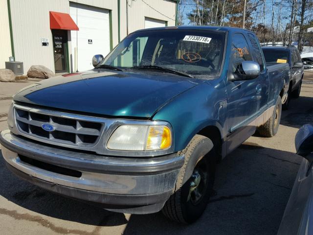 1FTDX1766VKB35895 - 1997 FORD F150 GREEN photo 2