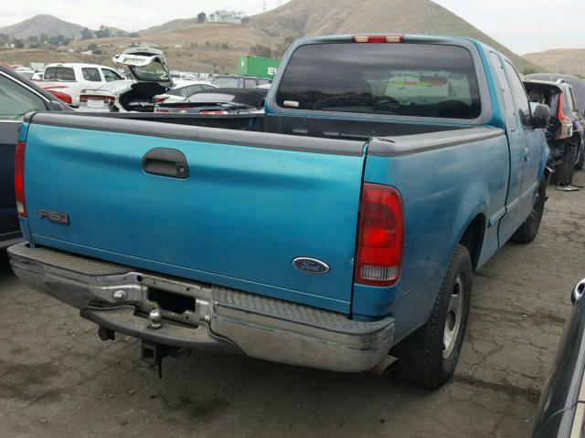 1FTZX1761WNB07377 - 1998 FORD F150 GREEN photo 4