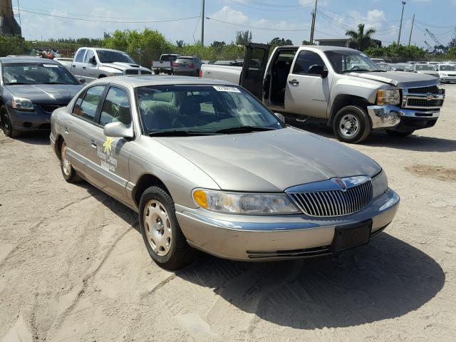 1LNHM97V01Y667081 - 2001 LINCOLN CONTINENTA GOLD photo 1