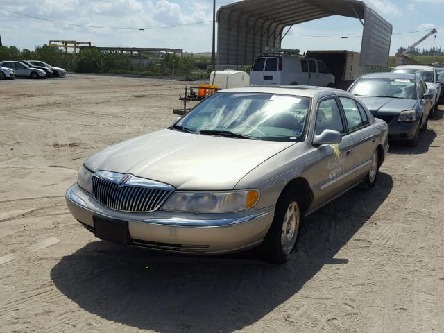 1LNHM97V01Y667081 - 2001 LINCOLN CONTINENTA GOLD photo 2