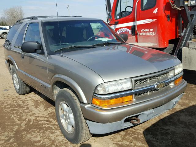 1GNCT18W5XK186997 - 1999 CHEVROLET BLAZER SILVER photo 1