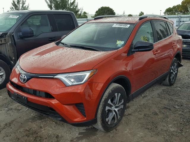 JTMBFREV2GJ080597 - 2016 TOYOTA RAV4 LE ORANGE photo 2