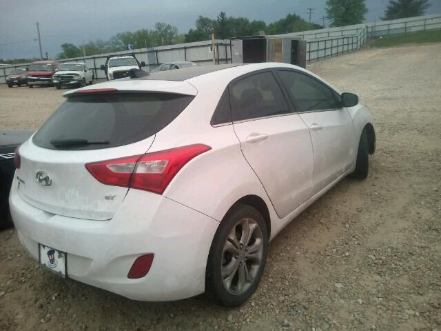 KMHD35LE8DU135590 - 2013 HYUNDAI ELANTRA GT WHITE photo 4