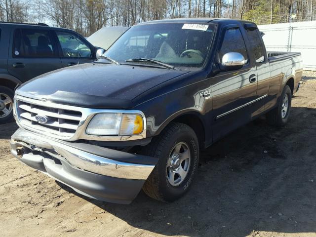 1FTRX17L3YKA12040 - 2000 FORD F150 BLUE photo 2