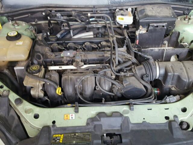 1FAFP34N77W142663 - 2007 FORD FOCUS ZX4 GREEN photo 7