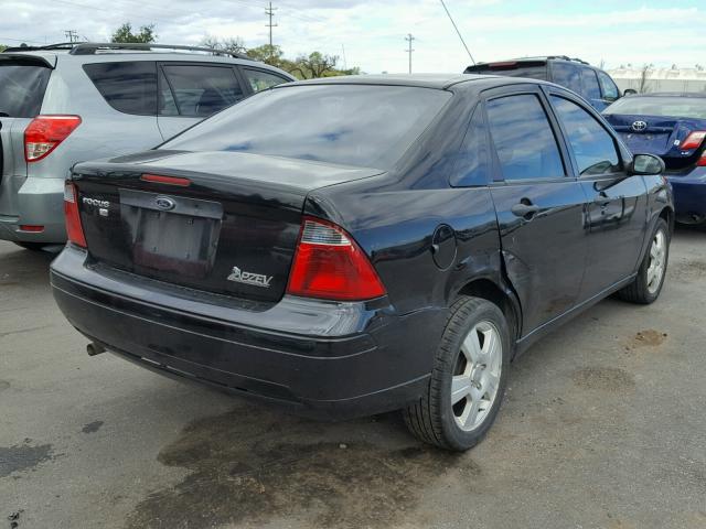 1FAFP34N27W161122 - 2007 FORD FOCUS ZX4 BLACK photo 4