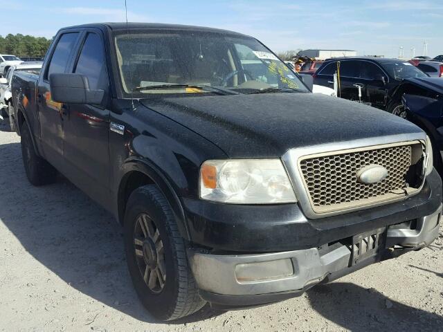 1FTPW12565FA41006 - 2005 FORD F150 SUPER BLACK photo 1