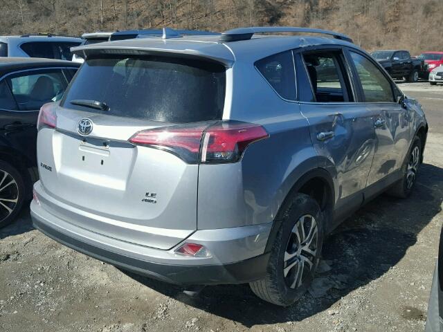 2T3BFREV2HW564854 - 2017 TOYOTA RAV4 LE SILVER photo 4