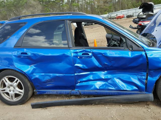 JF1GG29612G828619 - 2002 SUBARU IMPREZA WR BLUE photo 9