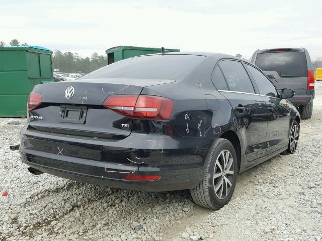 3VWDB7AJ2HM310930 - 2017 VOLKSWAGEN JETTA SE BLACK photo 4