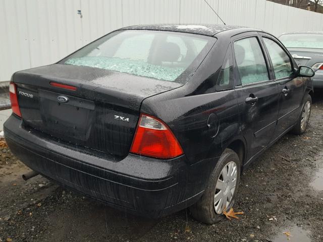 1FAFP34N46W157295 - 2006 FORD FOCUS ZX4 BLACK photo 4