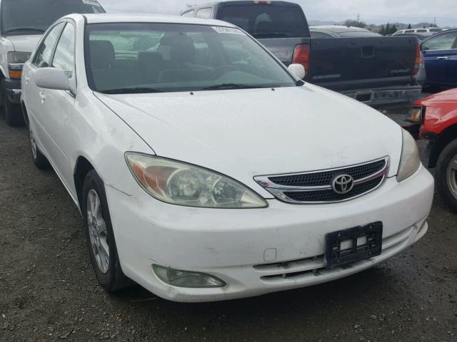 JTDBE30K340254336 - 2004 TOYOTA CAMRY LE WHITE photo 1