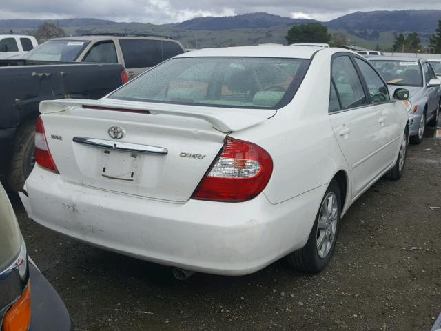 JTDBE30K340254336 - 2004 TOYOTA CAMRY LE WHITE photo 4