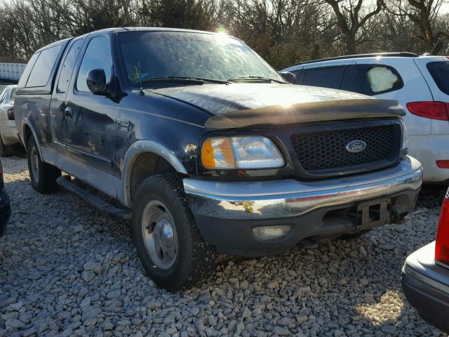 2FTRX18L1YCA17868 - 2000 FORD F150 BLACK photo 1