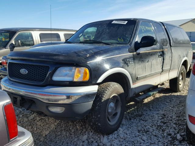 2FTRX18L1YCA17868 - 2000 FORD F150 BLACK photo 2