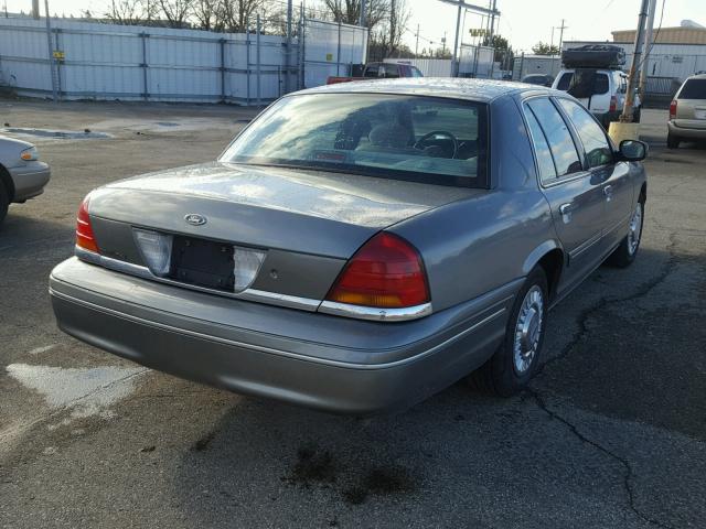 2FAFP73W7YX124509 - 2000 FORD CROWN VICT GRAY photo 4