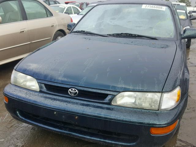 1NXBB02E1VZ569091 - 1997 TOYOTA COROLLA DX BLUE photo 9