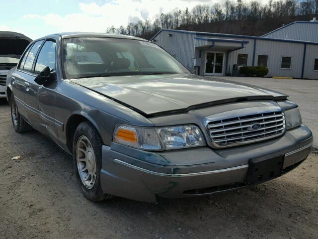 2FAFP74W3XX236625 - 1999 FORD CROWN VICT GRAY photo 1