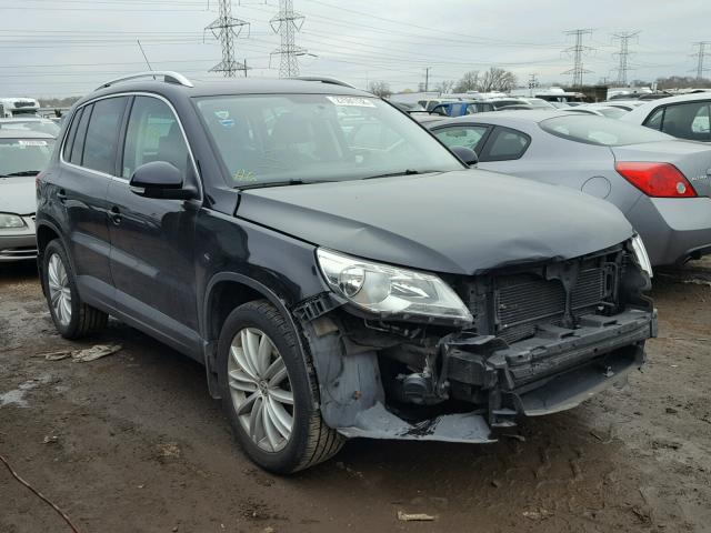 WVGAV7AX8BW500770 - 2011 VOLKSWAGEN TIGUAN S BLACK photo 1