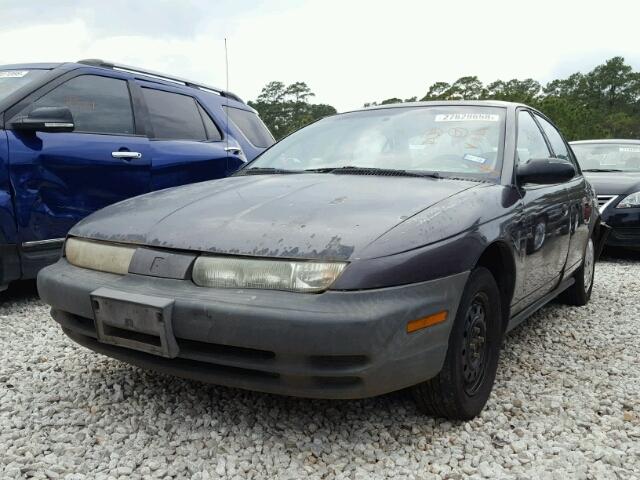 1G8ZG5283XZ168864 - 1999 SATURN SL1 GRAY photo 2