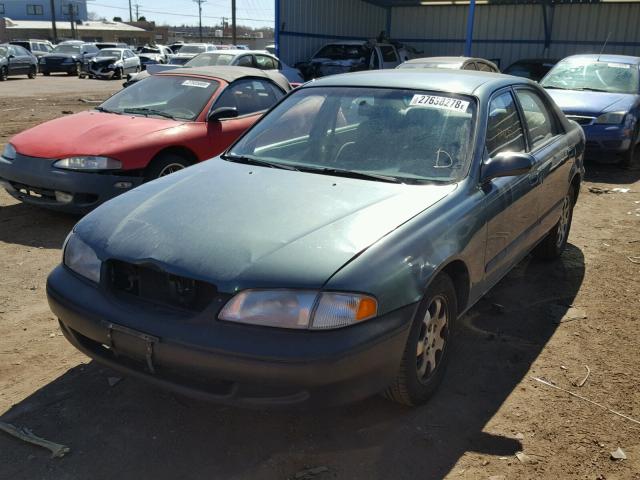 1YVGF22C2X5884479 - 1999 MAZDA 626 ES GREEN photo 2