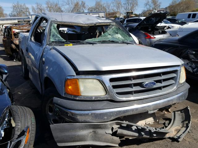 2FTRX17294CA20584 - 2004 FORD F-150 HERI GRAY photo 1