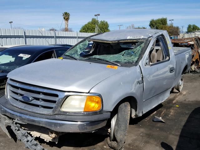 2FTRX17294CA20584 - 2004 FORD F-150 HERI GRAY photo 2