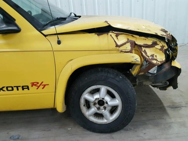 1B7GL22Z3XS126980 - 1999 DODGE DAKOTA YELLOW photo 9