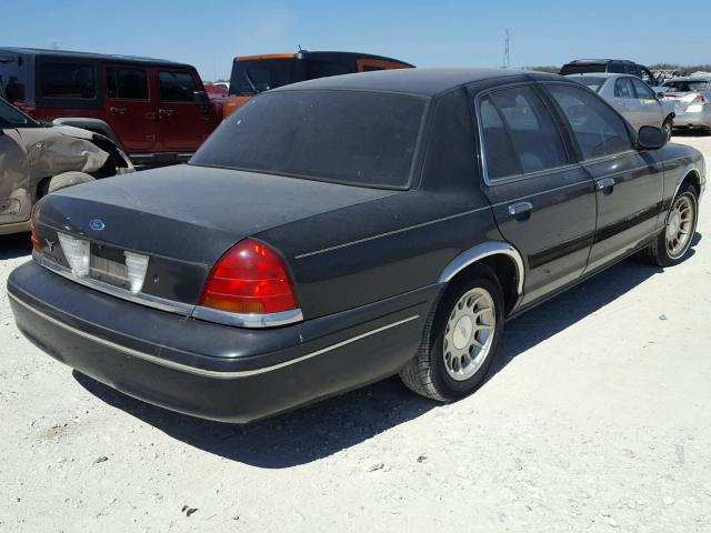 2FAFP74W3XX171632 - 1999 FORD CROWN VICT GRAY photo 4