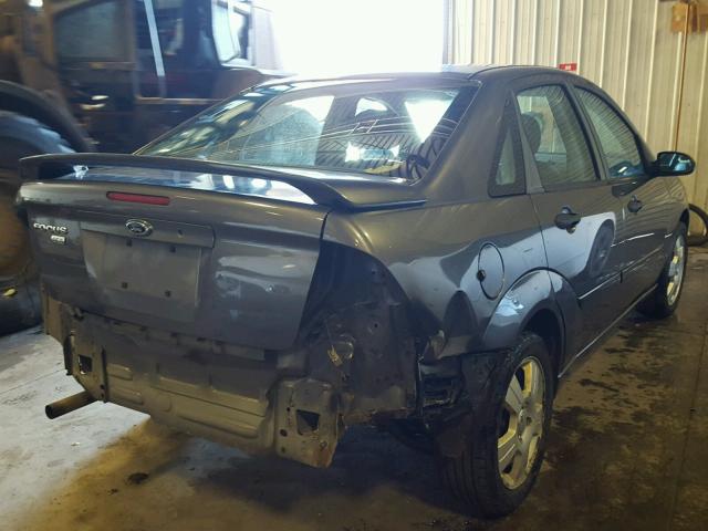 1FAHP34N17W204647 - 2007 FORD FOCUS ZX4 GRAY photo 4