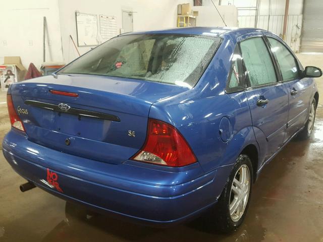 1FAFP34323W180424 - 2003 FORD FOCUS SE C BLUE photo 4