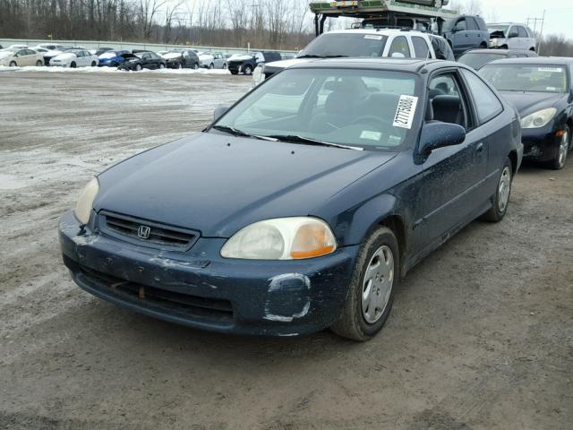 1HGEJ814XVL091885 - 1997 HONDA CIVIC EX GREEN photo 2