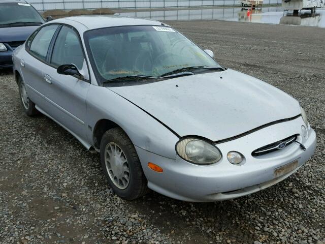 1FAFP53S4XG130788 - 1999 FORD TAURUS SE SILVER photo 1