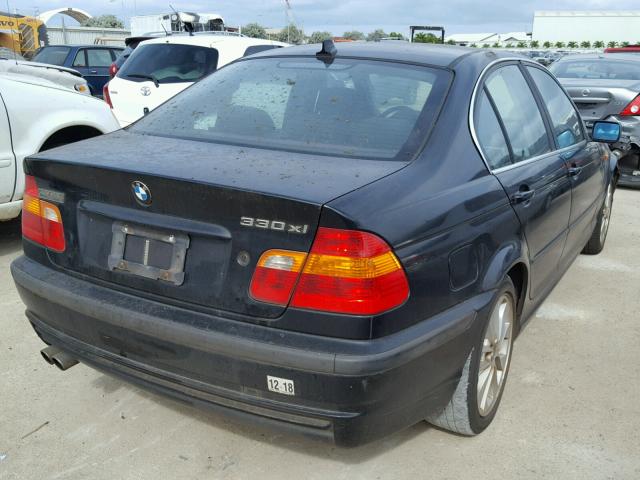 WBAEW53434PG10858 - 2004 BMW 330 XI BLACK photo 4