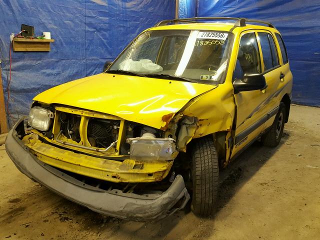 2CNBJ13C326950554 - 2002 CHEVROLET TRACKER YELLOW photo 2