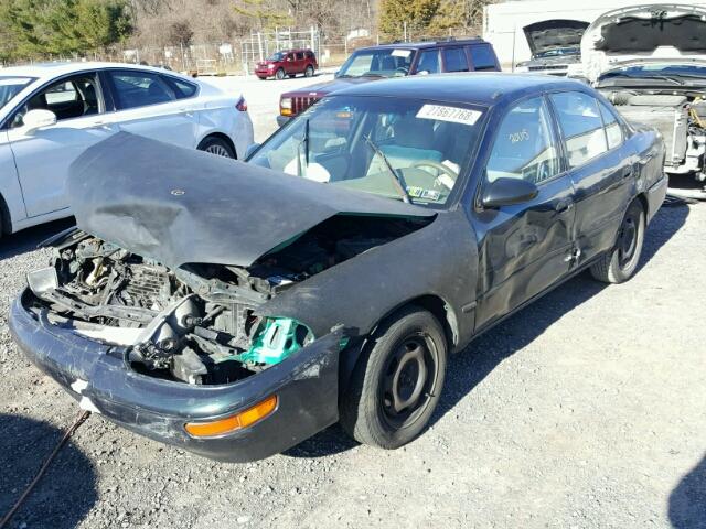 1Y1SK5263VZ461029 - 1997 GEO PRIZM BASE BLACK photo 2