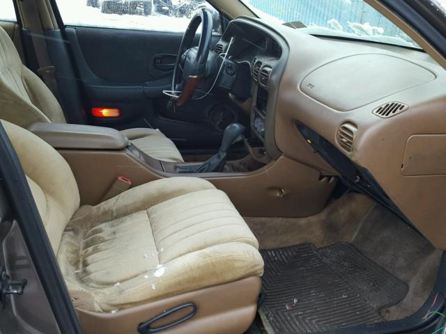 1G2WJ52K9XF274800 - 1999 PONTIAC GRAND PRIX BROWN photo 5