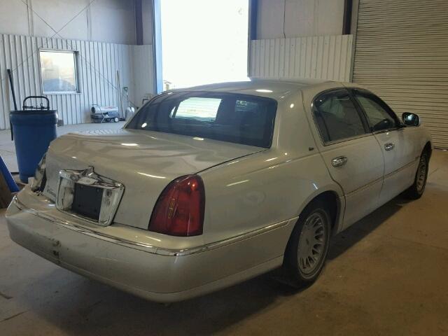 1LNHM83W11Y694685 - 2001 LINCOLN TOWN CAR C SILVER photo 4