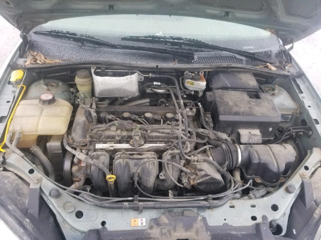 1FAFP34N25W166995 - 2005 FORD FOCUS ZX4 GREEN photo 7