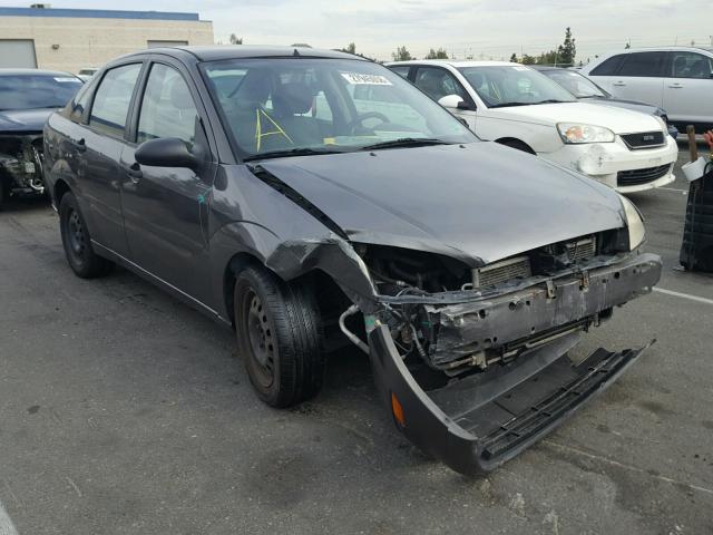 1FAFP34N55W311186 - 2005 FORD FOCUS ZX4 GRAY photo 1