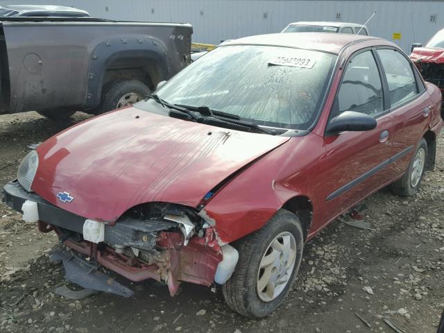 2C1MR522616711839 - 2001 CHEVROLET METRO LSI RED photo 2